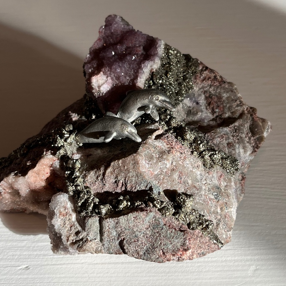 Amethyst Geode with pyrite and dolphins